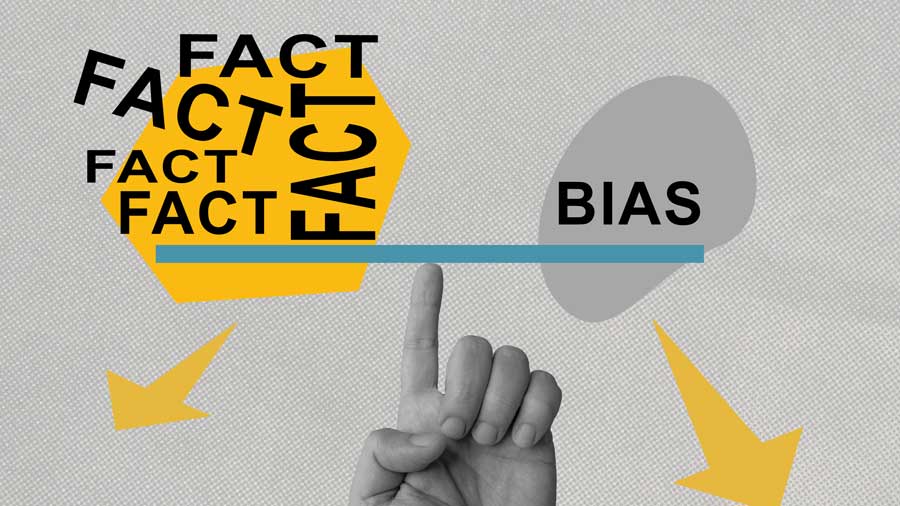 A hand balances the words 'fact' and 'bias' on a scale