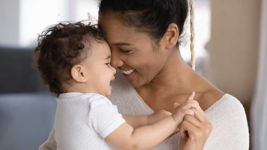 Happy mother and child at home
