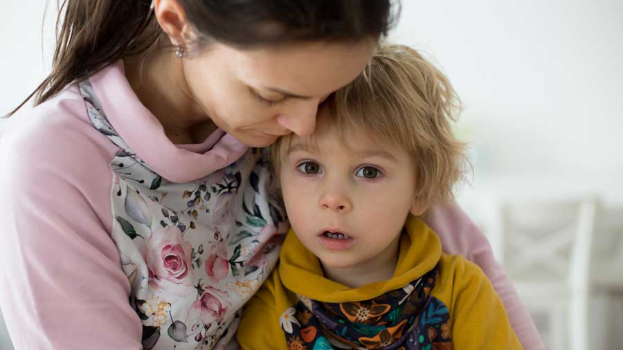 Mother hugging her son