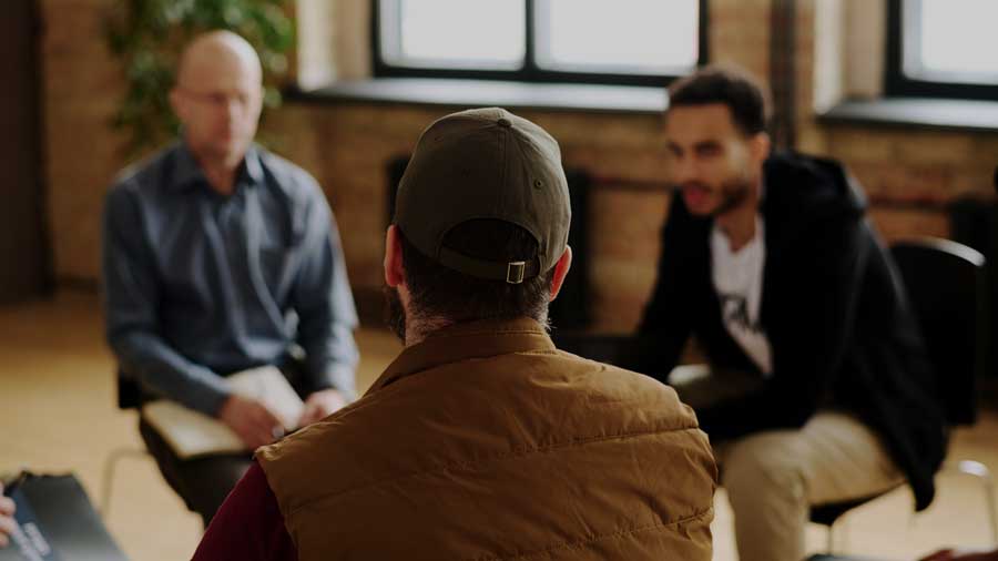 Men having a deep conversation